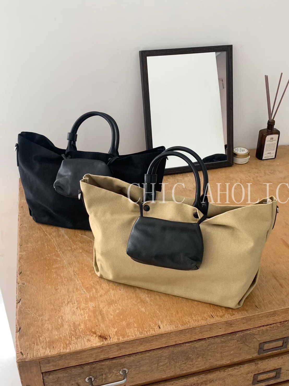 WN16黑提把鬆弛真皮子母包