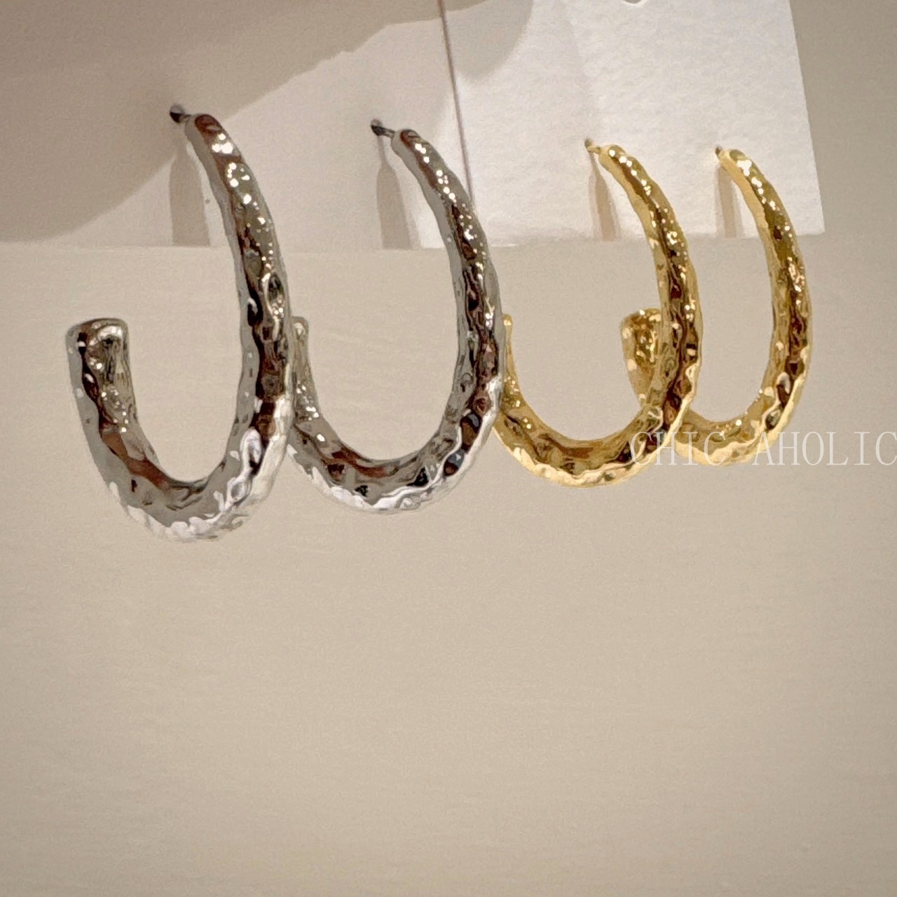 HH62洞壓紋橢圓耳環