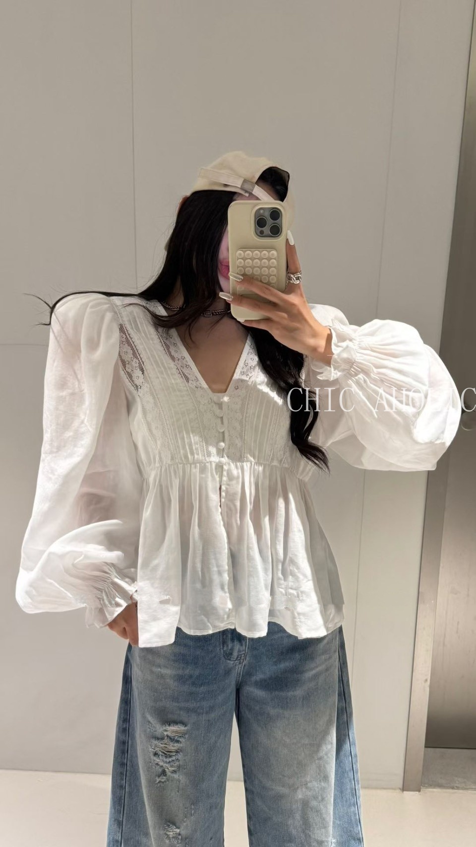 FEB28小釦緹花V澎袖衣