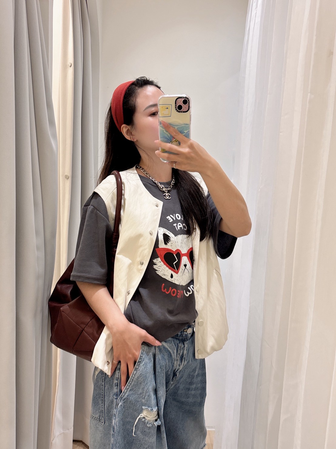 NE27皮革花苞背心