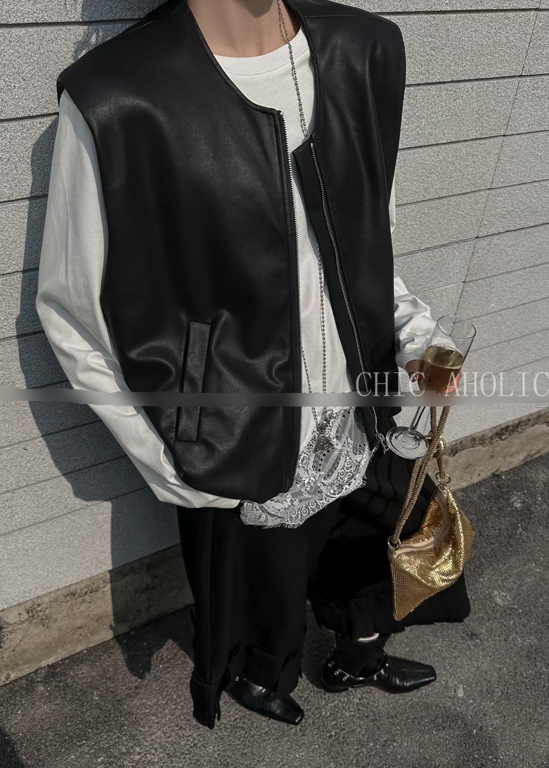 MEE22空氣感下擺拉鍊皮背心