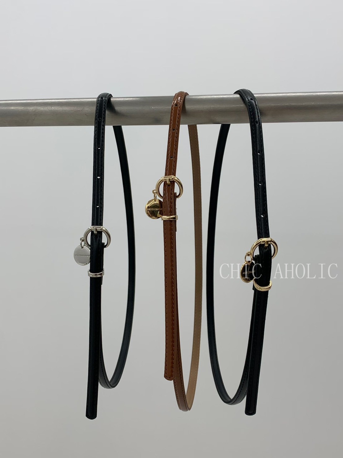 WR35小圓牌吊牌真皮細皮帶