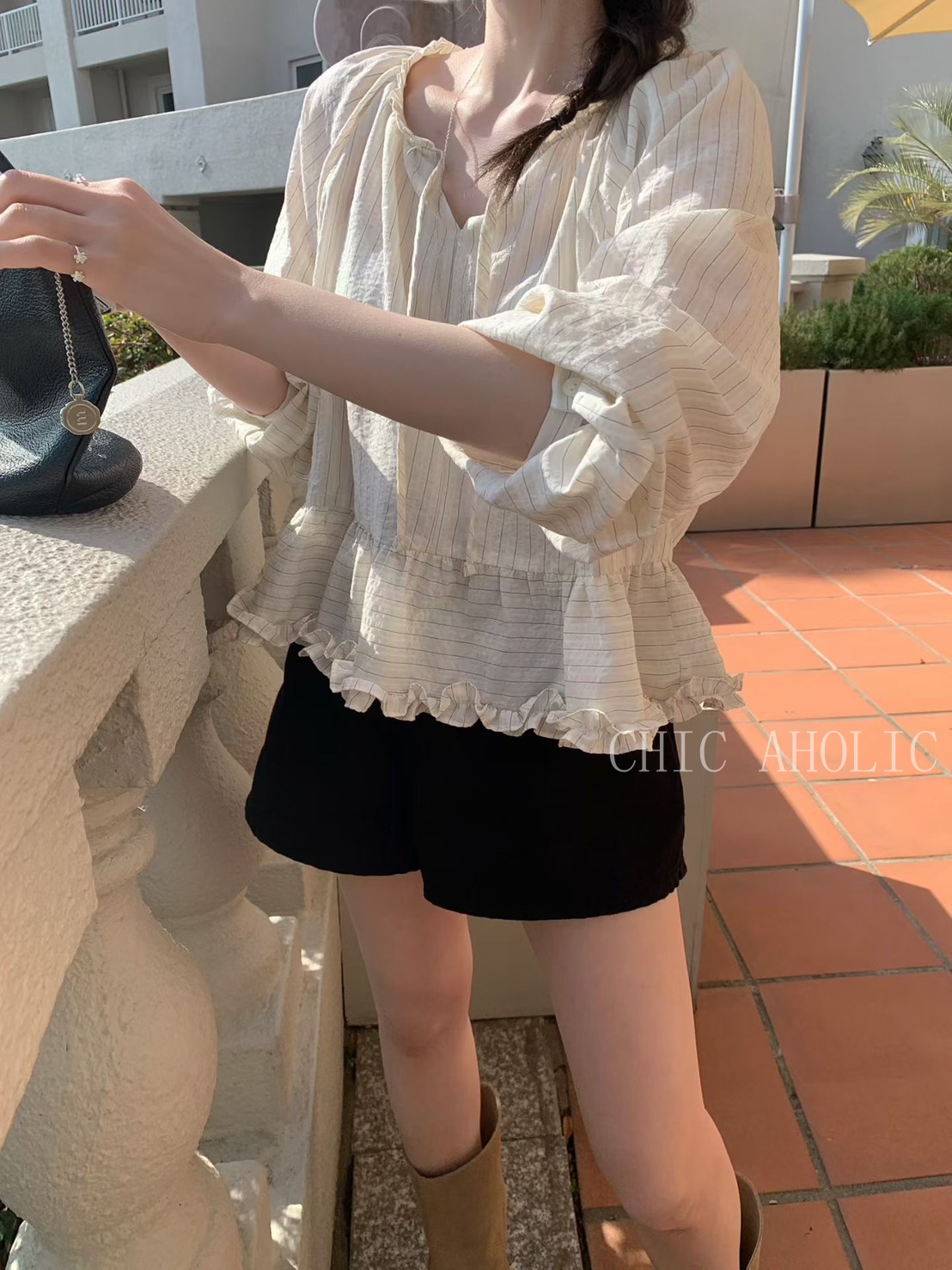 GR12澎袖有花朵波浪擺襯衫