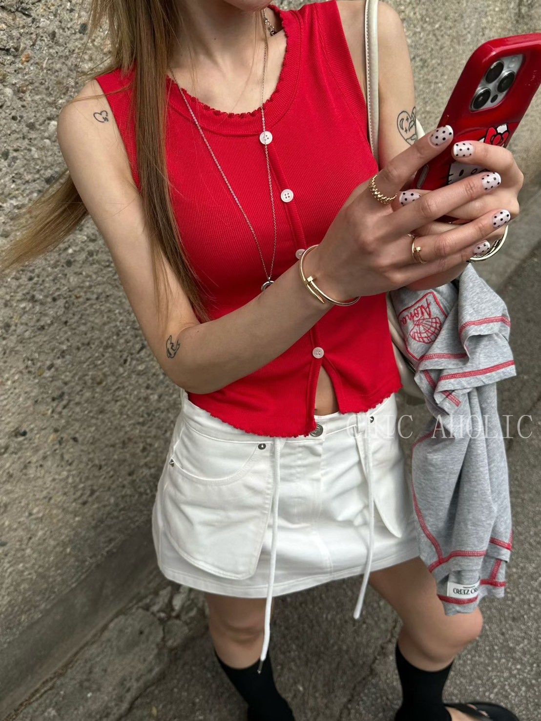 排釦不修邊設計寬肩背心